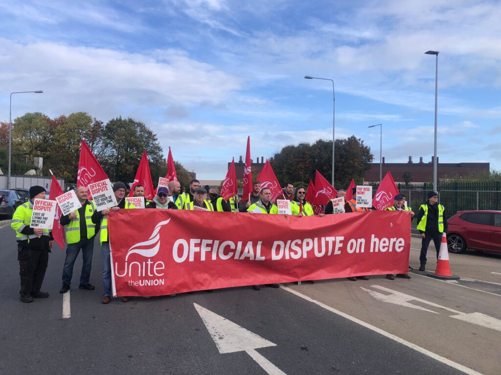 Unite's big red 'Official Dispute on here' held by 30 striking workers